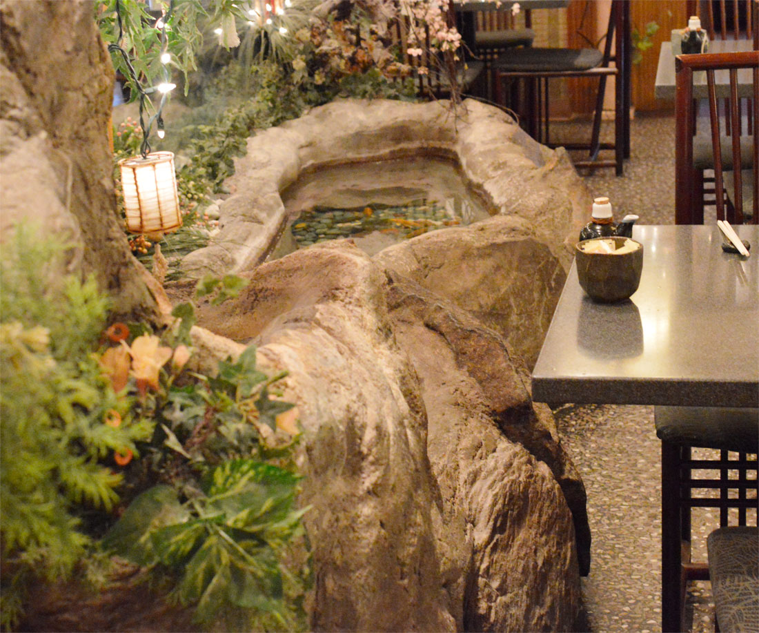 Indoor pond with swimming goldfish